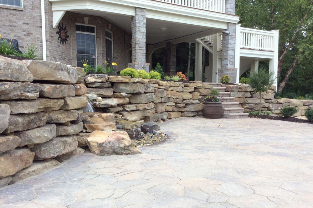Big Bend Landscaping water feature and retaining wall