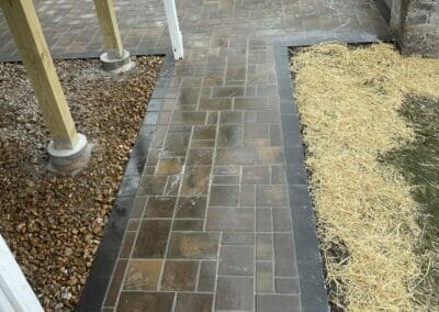 Pavers: Unilock Treo in Sierra color with a Slate border